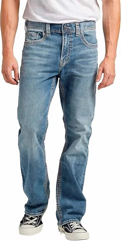SILVER JEANS CO. MEN'S CRAIG EASY FIT BOOTCUT JEANS IN LIGHT MARBLE INDIGO