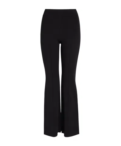 Simkhai Ashlon Flared-leg Stretch-knit Trousers In Black