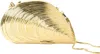 Simkhai Bridget Metal Oyster Shell Clutch In Gold