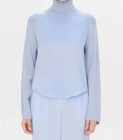 Simkhai Mateo Satin-paneled Knitted Turtleneck Sweater In Bleu