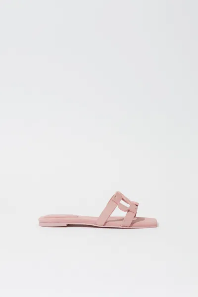 SIMKHAI MONOGRAM SUEDE FLAT SLIDE IN PALE PINK
