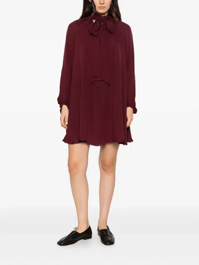 Simkhai Tie-neck Long-sleeve Mini Dress In Burgundy