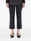 Simkhai Vera Pinstripe-pattern Trousers In Black