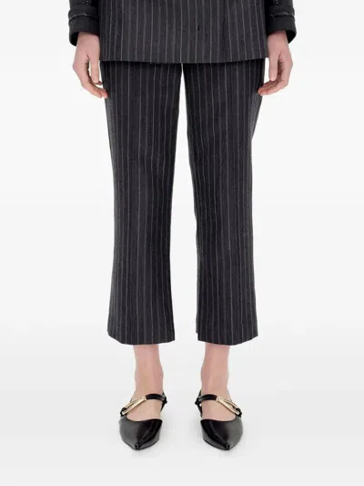 Simkhai Vera Pinstripe-pattern Trousers In Black