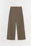 Simkhai Pleated Button-fastening Trausers In Brown