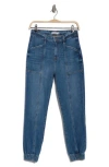 Simkhai Wylie Relaxed Jogger Denim Jeans In Dena