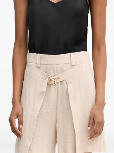 Simona Corsellini Buckled Pleated Shorts In Neutral