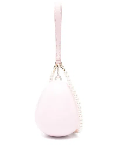 Simone Rocha Micro Pearl Egg Cross Body Bag In Pink