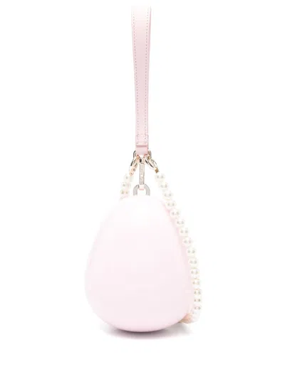 Simone Rocha Micro Pearl Egg Cross Body Bag In Pink