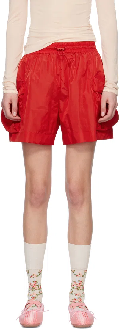 SIMONE ROCHA RED CARGO POCKET FLARE SHORTS