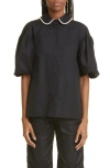 Simone Rocha Ruffle Trim Back Cutout Puff Sleeve Cotton Shirt In Black/pearl