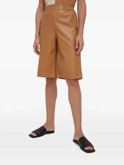 Sisley Paris Elasticated Faux-leather Shorts In Brown