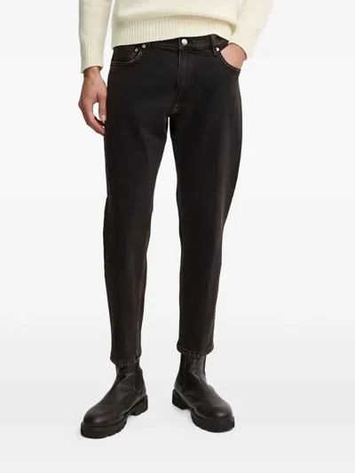 Sisley Paris Five-pocket Tapered Jeans In Black