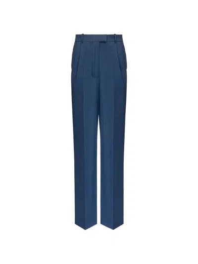 Situationist Pleated Virgin-wool Tailored Trousers In Blue