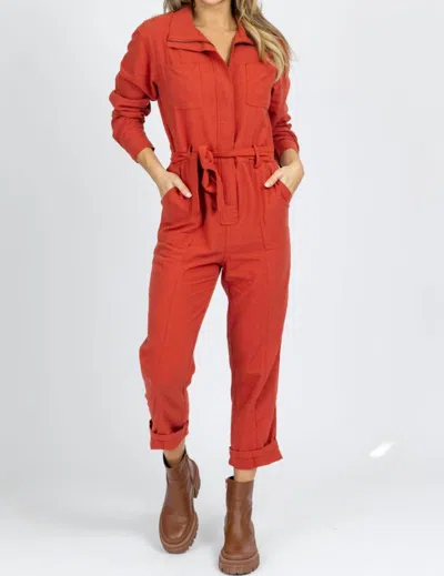 Skies Are Blue Long Sleeve Utility Jumpsuit In Deep Rust In Pink