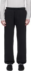 Skims Black Fleece Lounge Relaxed Sweatpants In Washed Onyx