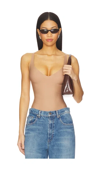 Skims Body Plunge Bodysuit In Nude