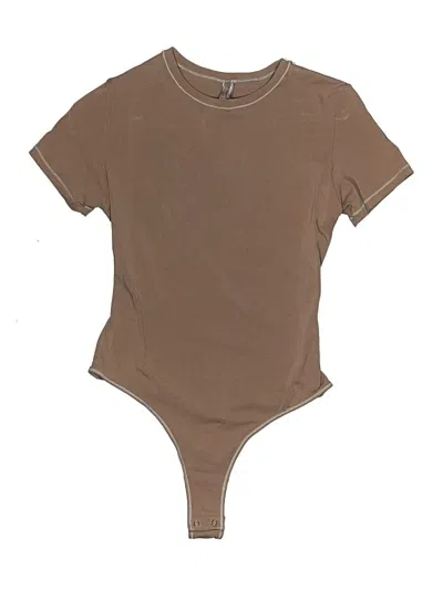 Pre-owned Skims Bodysuit In Tan