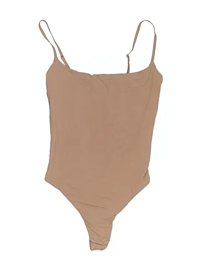 Pre-owned Skims Bodysuit In Tan