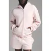 Skims Cotton Fleece Classic Zip-up Hoodie In Barely Pink
