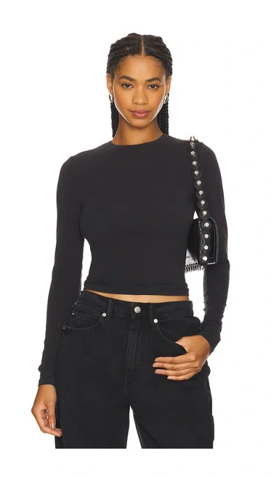 Skims Cotton Jersey Long Sleeve T-shirt In Black