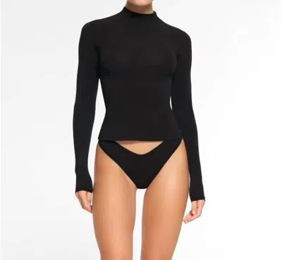 Skims Cotton Jersey Turtleneck Long Sleeve Tee In Onyx In Black
