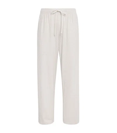 Skims Cotton Relaxed Sweatpants In White