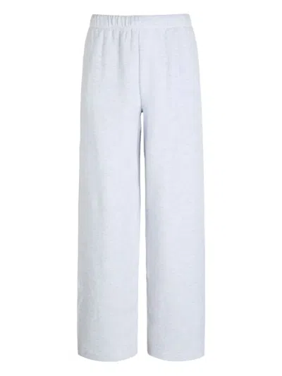 Skims Embossed Logo Trousers In Gray