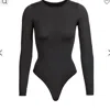 Skims Smoothing Long-sleeve Crewneck Thong Bodysuit In Black