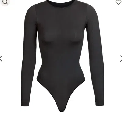 Skims Smoothing Long-sleeve Crewneck Thong Bodysuit In Onyx