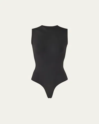 Skims Essential Sleeveless Crewneck Thong Bodysuit In Black