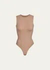 Skims Essential Sleeveless Crewneck Thong Bodysuit In Sienna