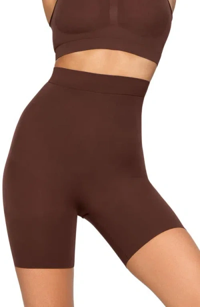 Skims Everyday Sculpt Mid Thigh Shorts In Brown