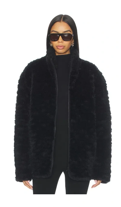 Skims Faux Fur Zip Up Mock Neck Jacket In Black