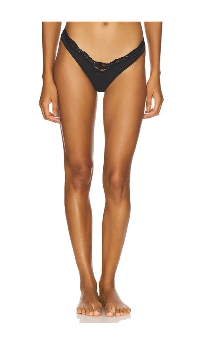 Skims Fits Everybody Lace Dip Thong In Black