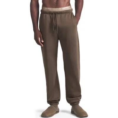 Skims Fleece Lounge Relaxed Joggers In Brown