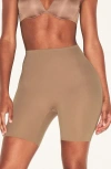 Skims Hip Enhancing Mid Thigh Padded Shorts In Brown
