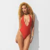 Skims Iconic Swim In Brown