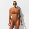 Skims Iconic Swim In Brown