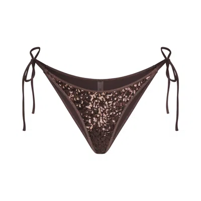 Skims Iconic Swim In Brown