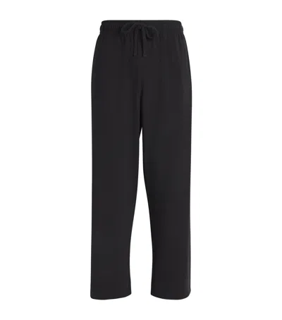 Skims Jersey Lounge Straight Sweatpants In Black