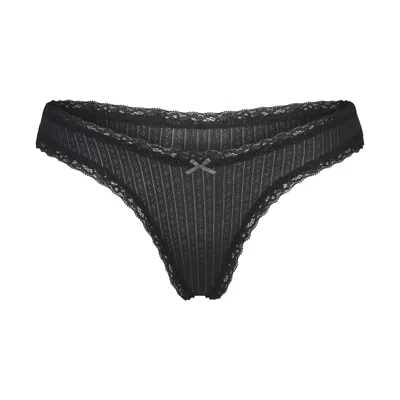 Skims Low-rise Thong Underwear In Black