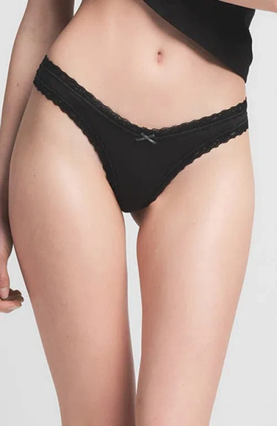 Skims Lightweight Cotton Lace Trim Thong In Soot Tonal