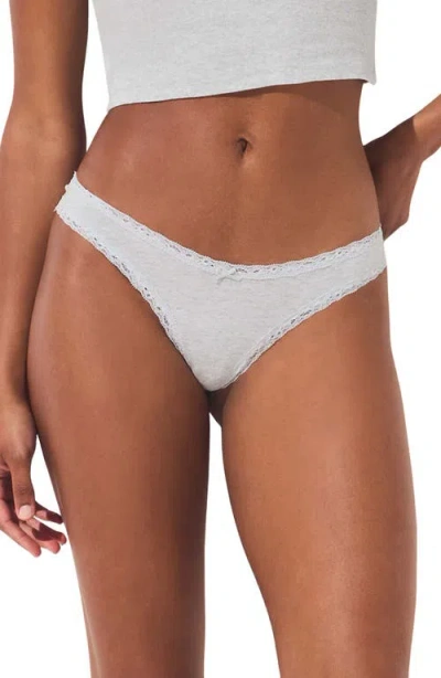 Skims Lightweight Cotton Lace Trim Thong In White