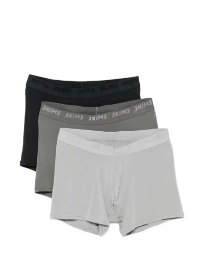 Skims Logo-waistband Boxers (pack Of Three) In Black