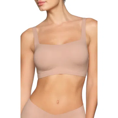 Skims Naked Wireless Scoop Bra In Clay