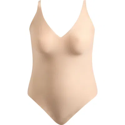Skims Plunge Thong Bodysuit In Nude