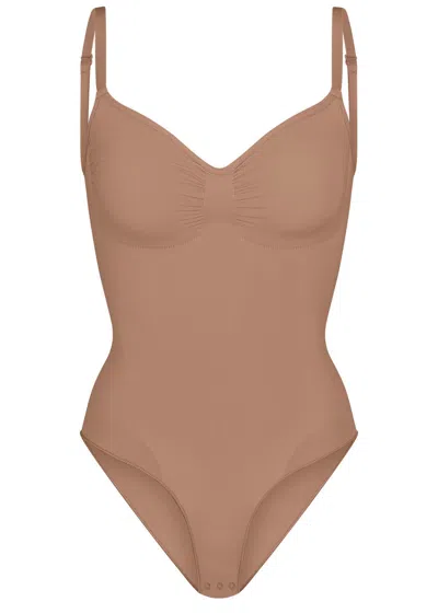 Skims Seamless Sculpt Brief Bodysuit In Brown