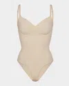 Skims Seamless Sculpt Thong Bodysuit In Sand