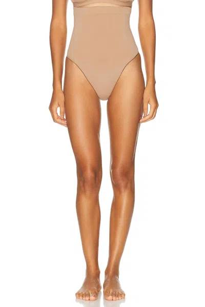 Skims Seamless Sculpt High Waist Thong In Brown